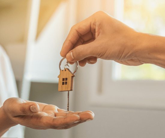 Person filling out a rental application form